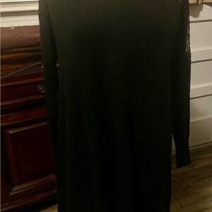 Classic Black Long-Sleeve Women's Dress with Delicate Sleeve Detail